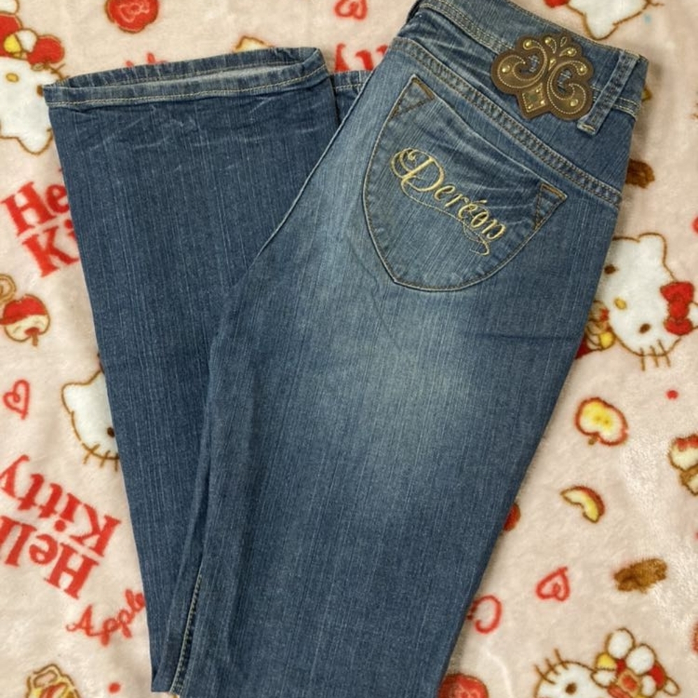 beyonce jeans with gold accents
